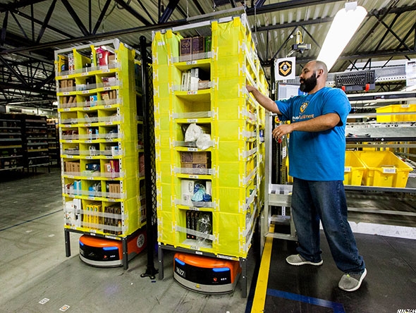 亚马逊部署3万仓储机器人：每年可省9亿美元成本1